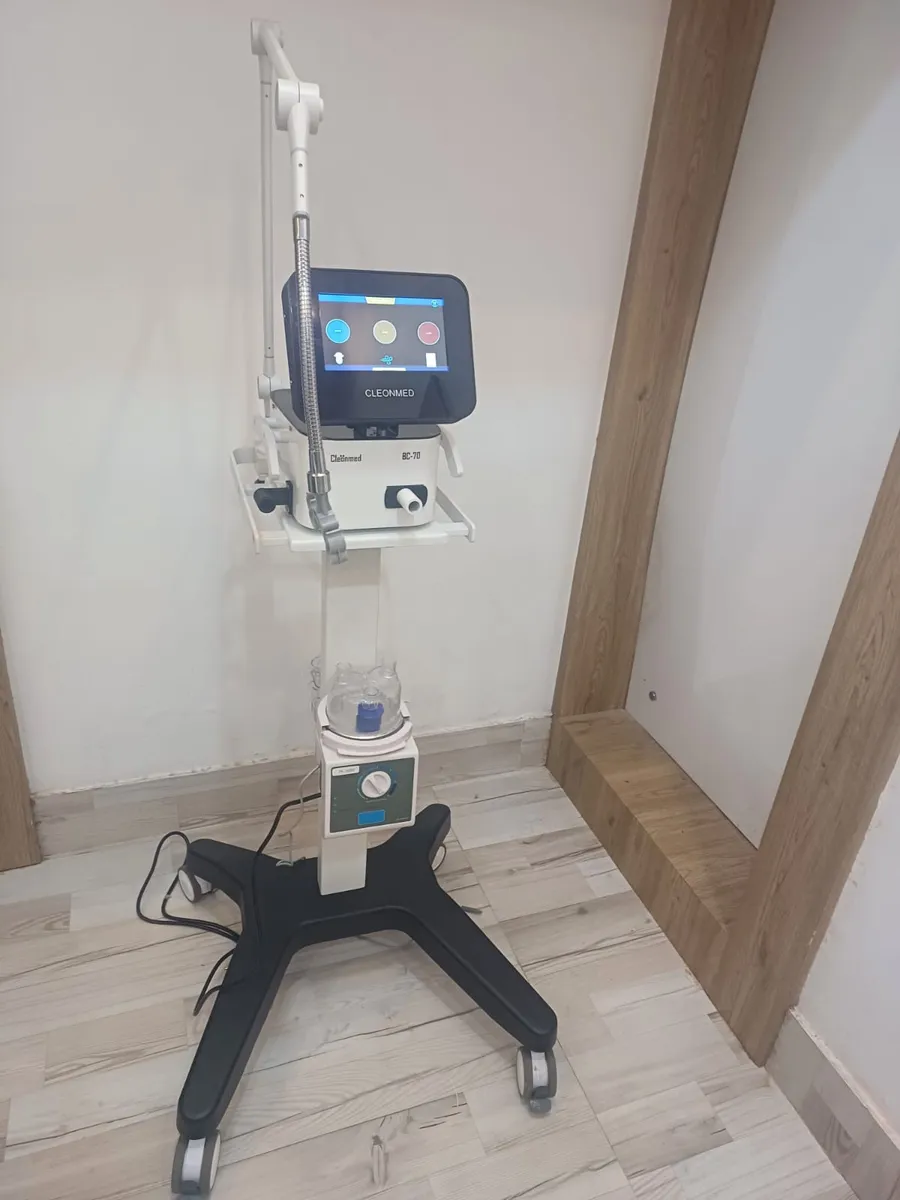 BC-70 from the front, showing the touch screen, humidifier and wheeled base