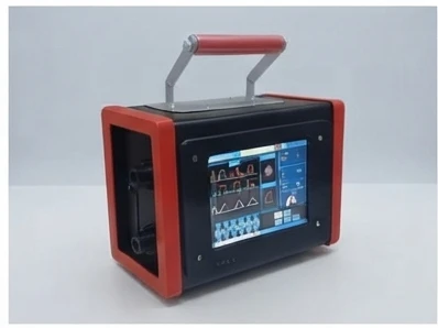 Cleo T8 ventilator with red carry handle, showing live waveforms on its 8-inch touch screen